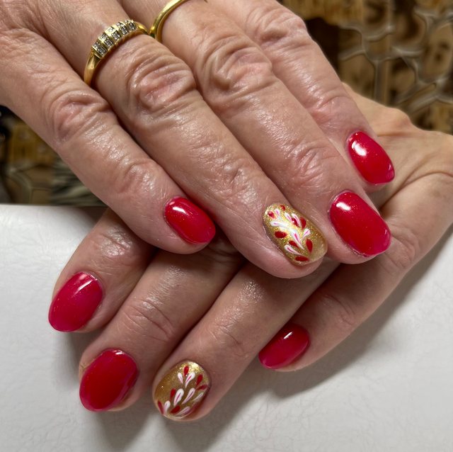 Manucure rouge, réalisation de Bel Ongle Institut